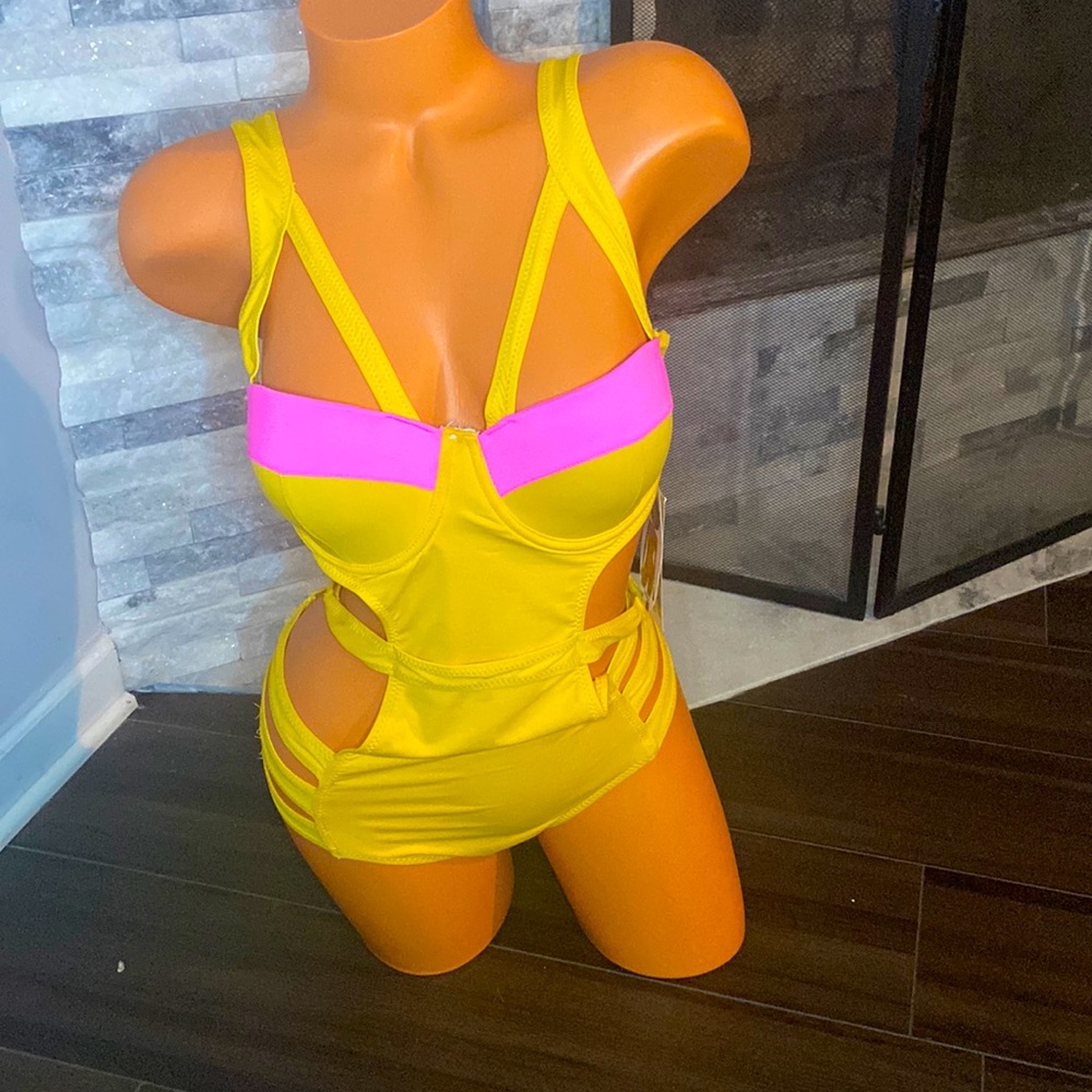 Gold and pink unworn bathing suit. 💛💖